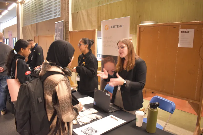 FortiBC booth explaining