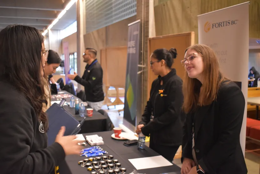 FortisBC booth listening