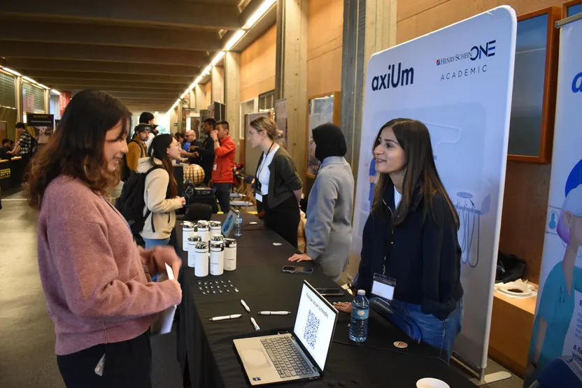 Henry Schein One booth discussion