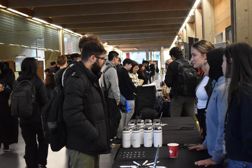 Henry Schein One booth talking